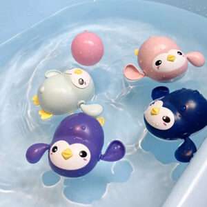 JUGUETE DE BAÑO PINGUINO CON MOVIMIENTO ROSADO (JTJUG963ROS)