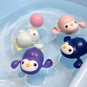 JUGUETE DE BAÑO PINGUINO CON MOVIMIENTO VERDE (JTJUG963VER)